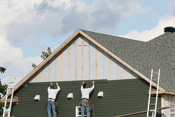 Professional Siding Contractor technician working in Irving, TX